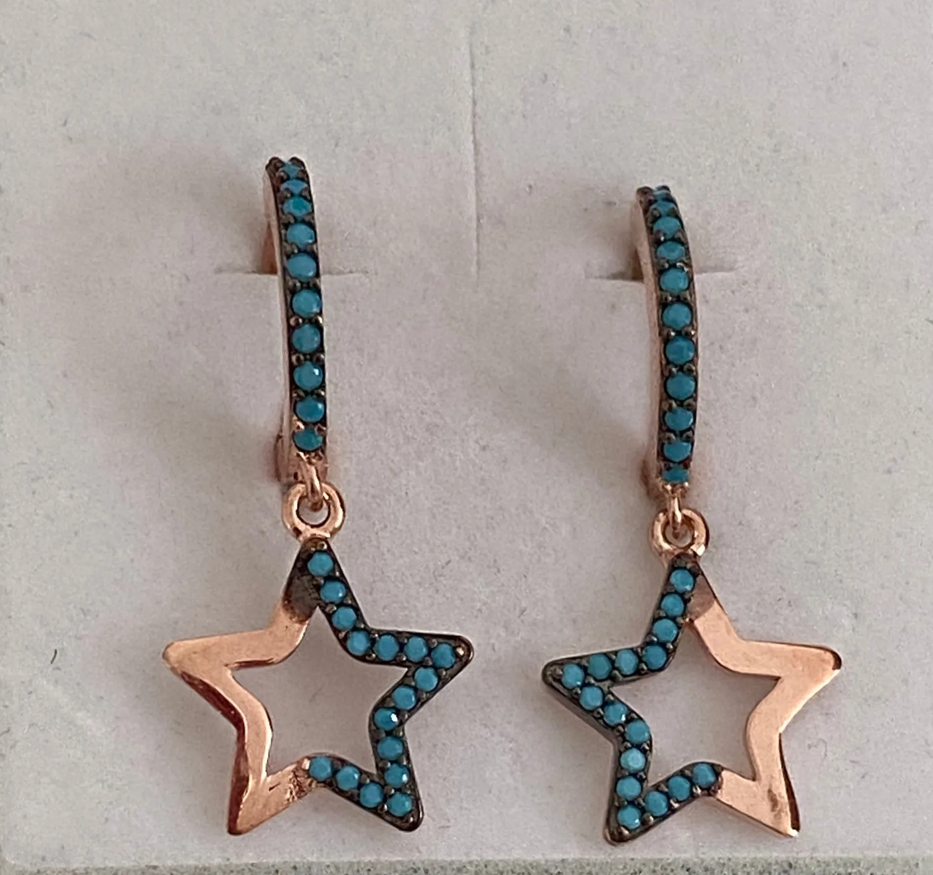Earrings with paveset stones